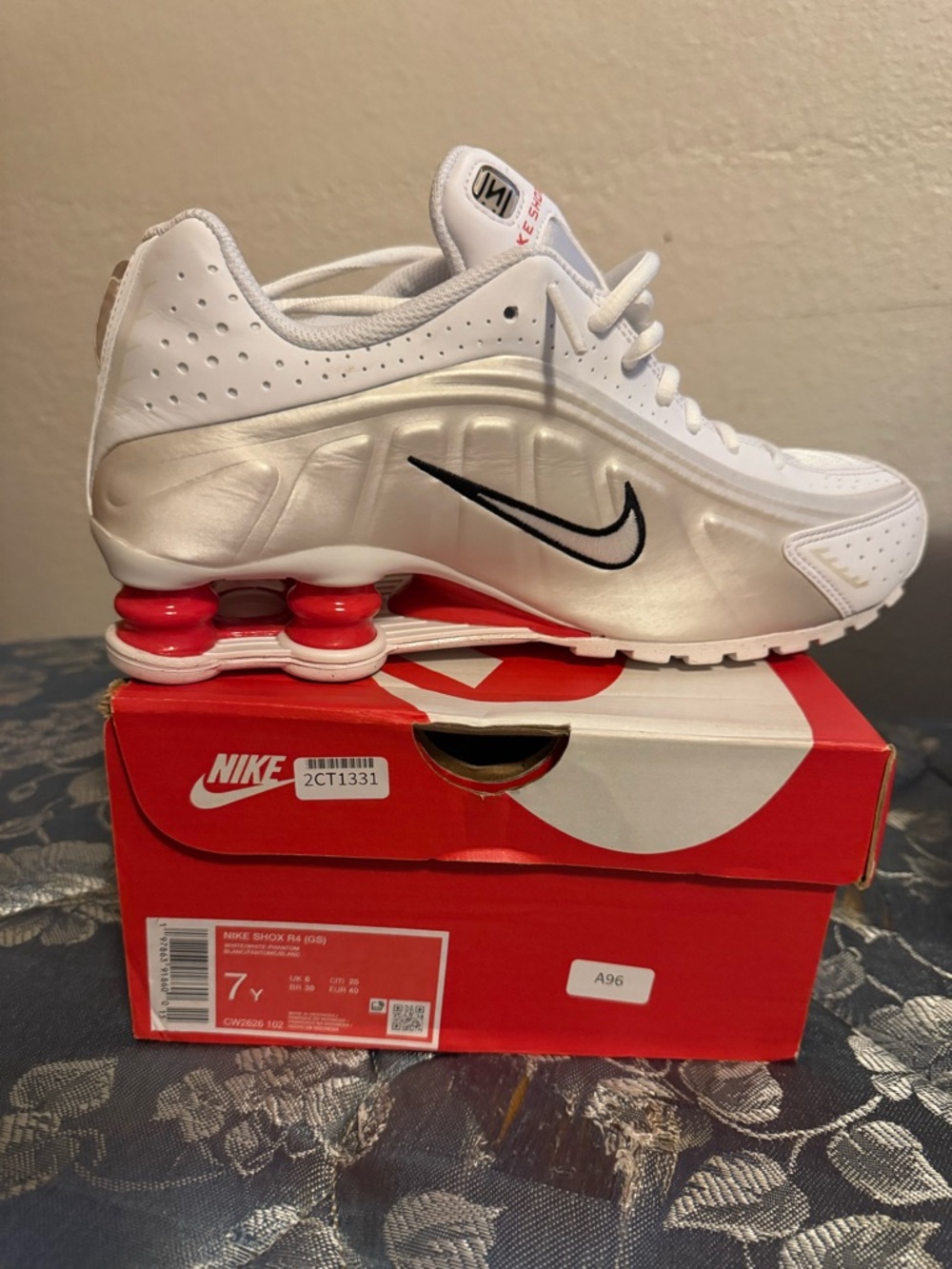 Nike White Silver Sneakers with Black Swoosh and Red Shox